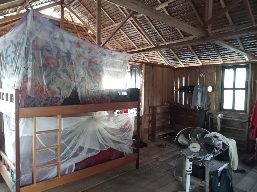 Male volunteers beach bungalow